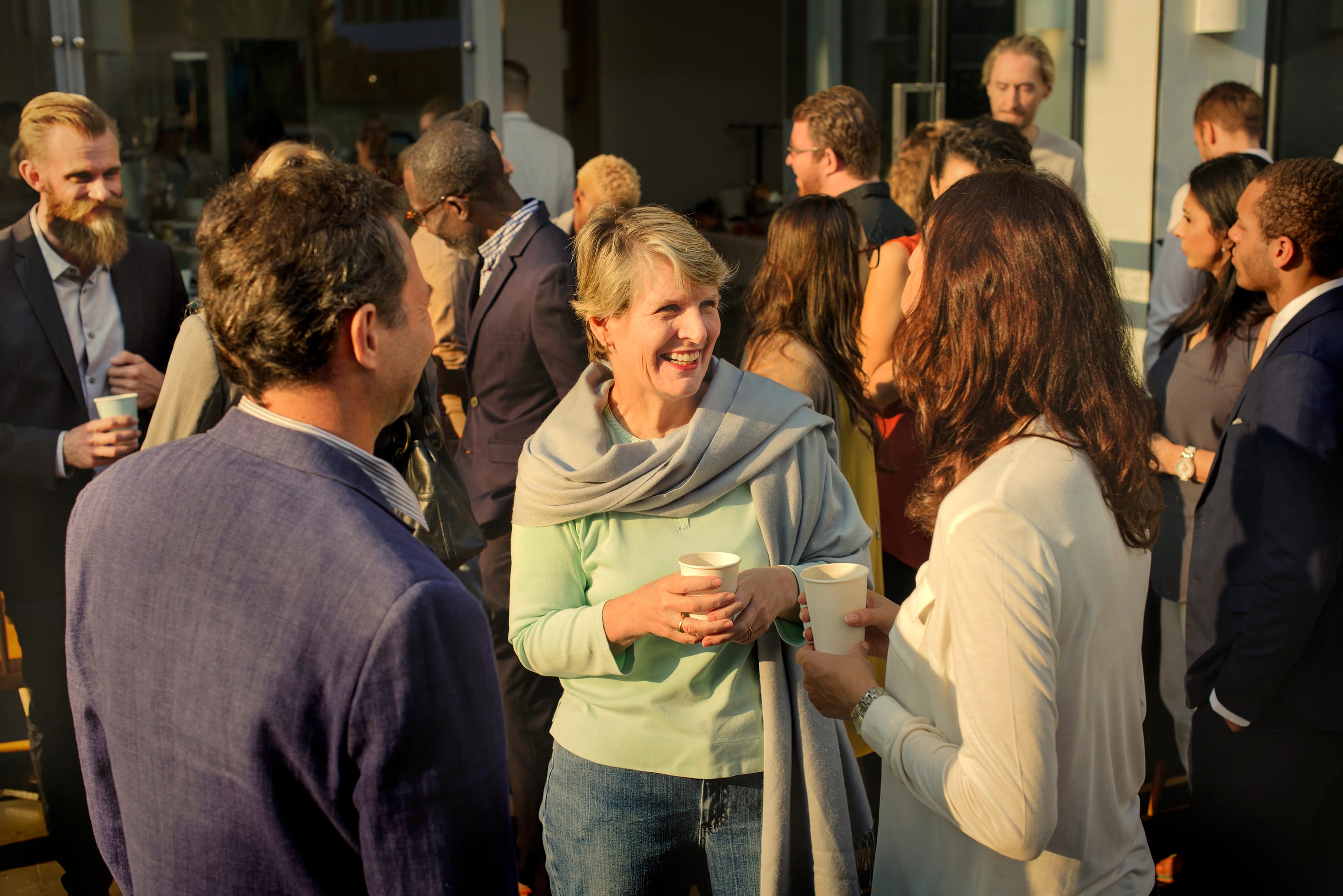 Diverse people mingling at an event
